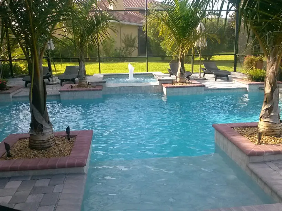 Raised planter islands with palms