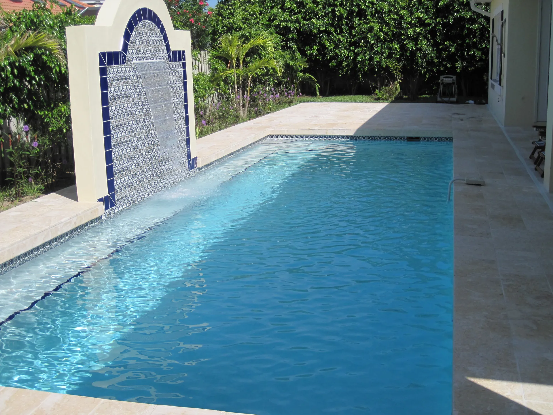 Custom arched tile fountain wall