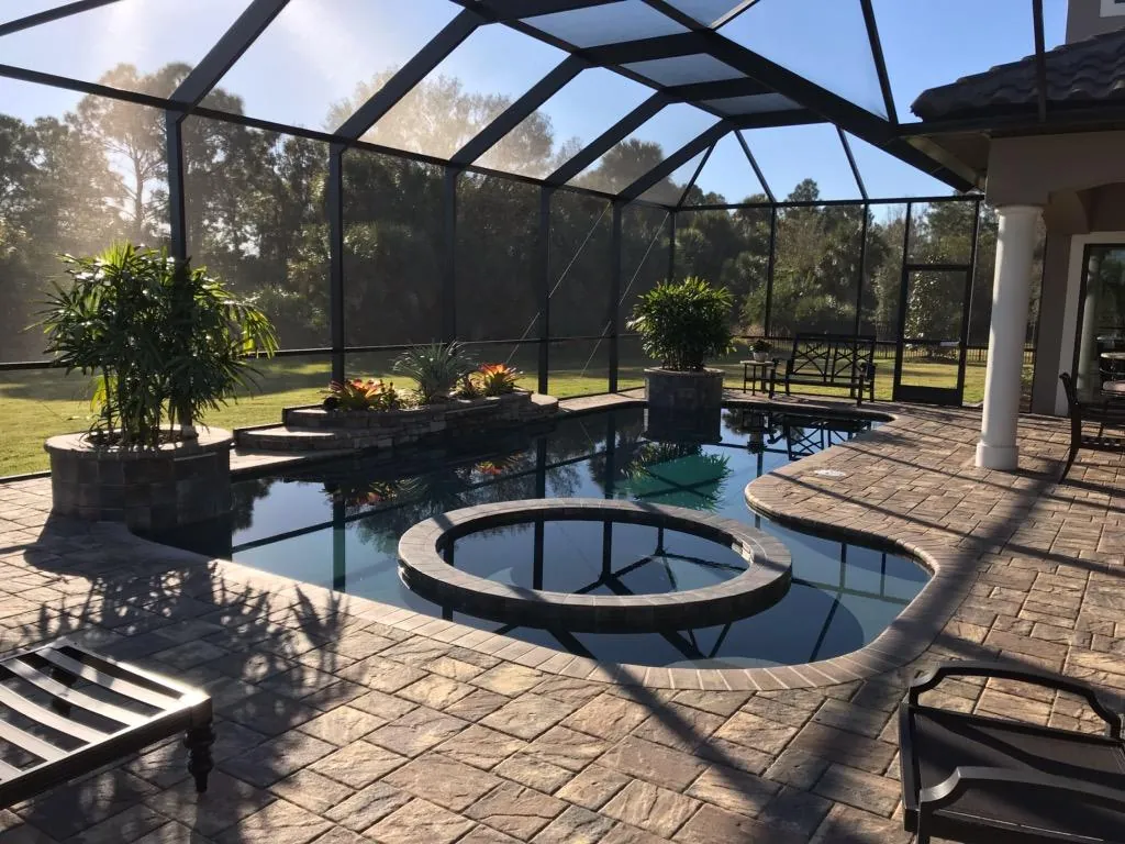 Raised round spillover spa