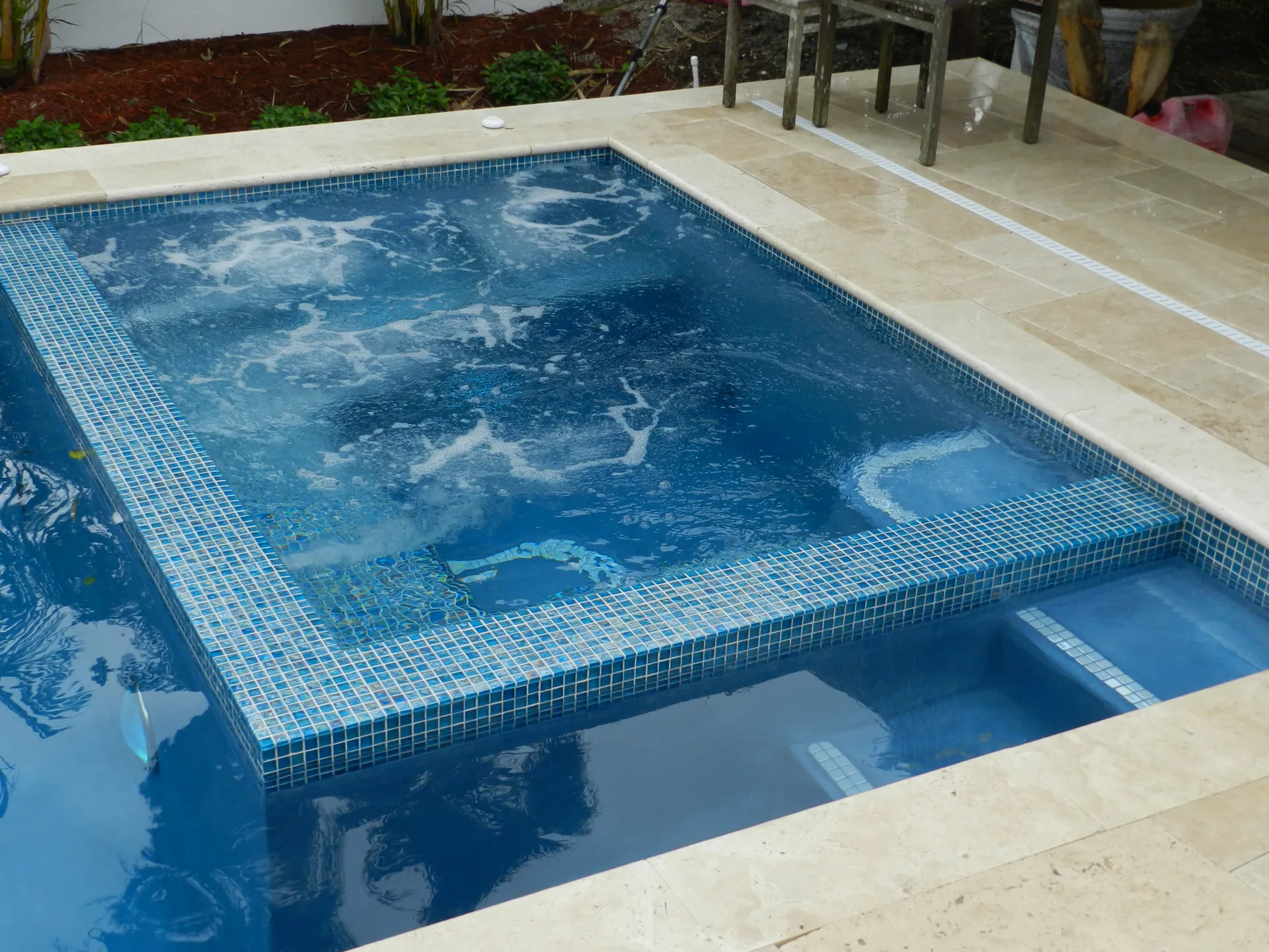 Glass mosaic tile spa trim